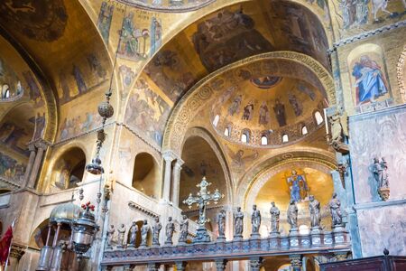 Luxury interior of Saint Mark's Basilica with gold and lots of mosaics. Venice, Italy
