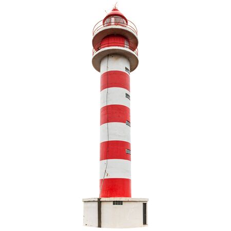 Striped red and white lighthouse at rocky coast of Gran Canaria island, Spainの写真素材
