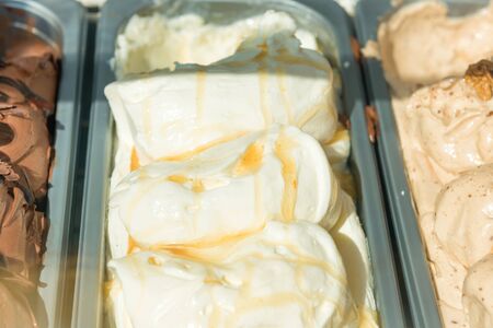 Gelato ice cream with chocolate and vanilla flavor in a store trayの写真素材