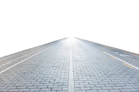 Brick road on empty city street isolated on white backgroundの写真素材