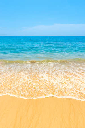 Blue sea blue water and sand beach with blue sky as summer holiday vacation background