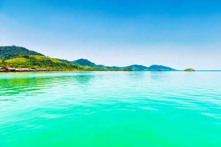 Island in blue sea, calm sea landscape with blue waterの写真素材