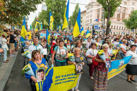 KIEV, UKRAINE - AUGUST 24, 2020: People with flags on March of defenders, parade in Kyiv, dedicated to the Independence Day of Ukraine, 29th anniversary.のeditorial素材