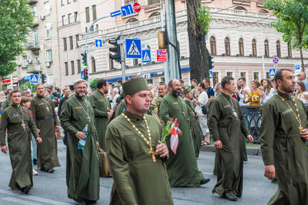 KIEV, UKRAINE - AUGUST 24, 2020: Military priests on March of defenders, parade in Kyiv, dedicated...