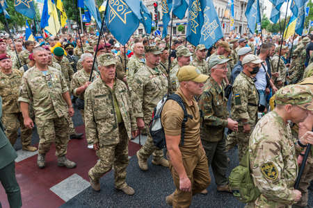 KIEV, UKRAINE - AUGUST 24, 2020: Soldiers and veterans on March of defenders, parade in Kyiv, dedicated to the Independence Day of Ukraine, 29th anniversary.のeditorial素材