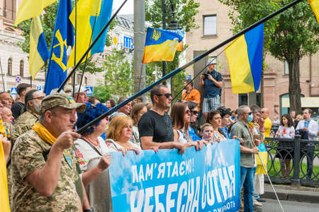 KIEV, UKRAINE - AUGUST 24, 2020: People with flags on March of defenders, parade in Kyiv, dedicated to the Independence Day of Ukraine, 29th anniversary.のeditorial素材