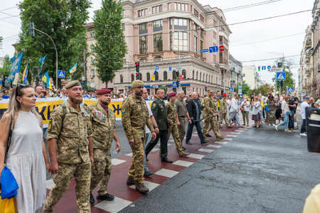 KIEV, UKRAINE - AUGUST 24, 2020: Oleksands Turchinov, Mykhailo Zabrodskyi and Marusya Zverobiy, soldiers and veterans on March of defenders, parade in Kyiv, dedicated to the Independence Day of Ukraine, 29th anniversary.のeditorial素材