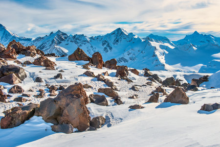 Snowy blue mountains in clouds. Winter ski resortの写真素材
