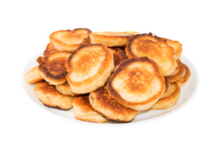 Sweet toasted pancakes on white plate and isolated white backgroundの写真素材