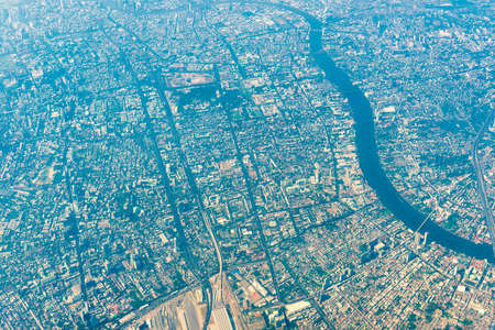 Aerial view to Bangkok downtown from a plane. Thailand asian city from aboveの写真素材