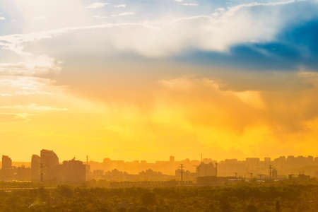 Sunset in big city, downtown cityscape with sunset skyの写真素材