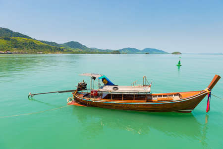 Traditional Thai boat with long tail. Sea boat landscape