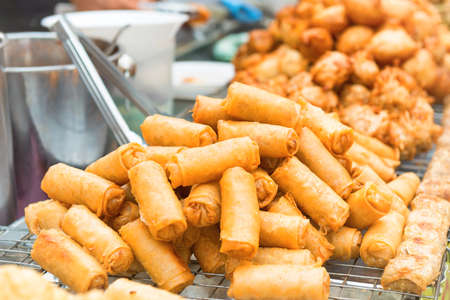 Delicious of traditional asian cuisine. Hot fried snacks at street marketの写真素材