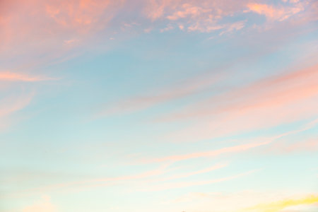 Sunset or morning sunrise sky with sunset clouds, nature spring sunset backgroundの写真素材