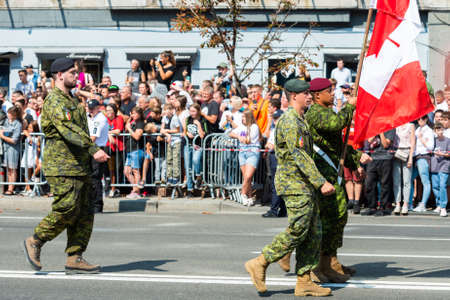 KIEV, UKRAINE - AUGUST 24, 2021: Military parade in Kiev, dedicated to the Independence Day of Ukraine, 30th anniversary. Marching NATO military troops from Canada on Khreshchatyk streetのeditorial素材