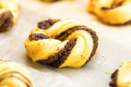Raw buns rolls in bread bakery ready for ovenの写真素材