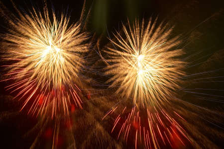 Colorful fireworks on the black sky backgroundの写真素材