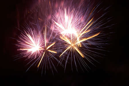 Colorful fireworks on the black sky backgroundの写真素材