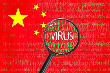 China internet virus concept over hacker cyber attack. Chinese flag with internet matrix binary data through magnifying glassの写真素材