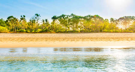 Sea to sunset beach landscape panorama. Island sand and blue sea landscape.の写真素材