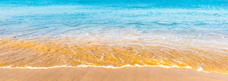 Blue sea water and sand beach panoramaの写真素材