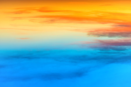 Sunset dramatic sky with colorful clouds as nature sunset backgroundの写真素材