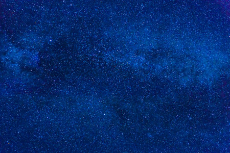 Dark blue night sky with many stars, cosmos milky way backgroundの写真素材