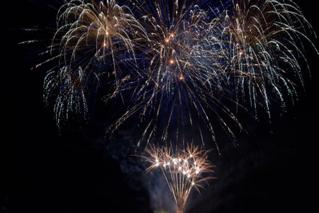 Colorful fireworks on the black sky backgroundの写真素材