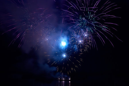 Colorful fireworks on the black sky backgroundの写真素材