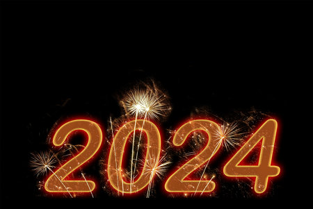 2024 new year red fireworks on black sky background. New year celebrationの写真素材
