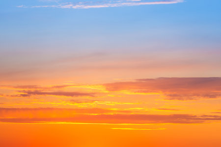 Sunset sky with sunset clouds and watercolor skyの写真素材