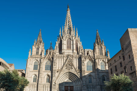 Facade of gothic Cathedral Of Barcelona in Spainの写真素材