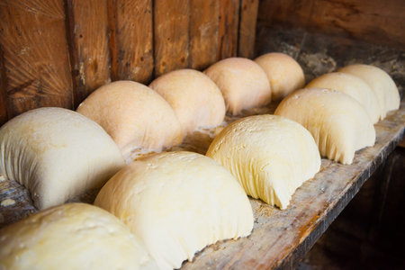 Rustic production of homemade farm cheese and dairy productsの写真素材