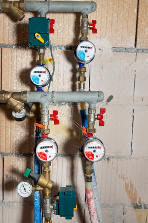 Water meters for cold and hot water, pipe plumbing countersの写真素材
