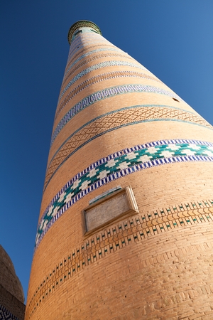 Closeup view of Islom Hoja Minaret in Itchan Kala   old centre of Khiva Khorezm Republic of Karakalpakstan Uzbekistan.の写真素材