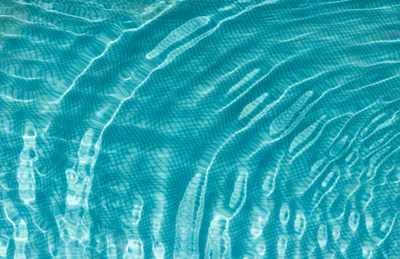 Surface of the water in the pool. Texture of the waterの写真素材