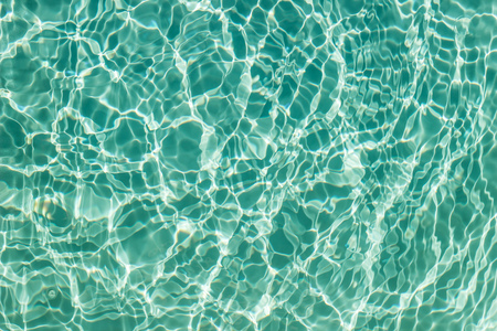 Surface of swimming pool water backgroundの写真素材