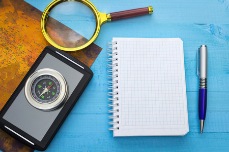 Kit traveler. Pen blank Notepad on the tableの写真素材