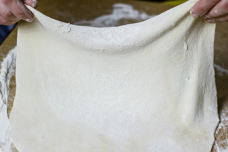 Housewife making the dough for dumplingsの写真素材