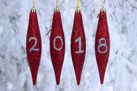 merry christmas decoration on background snow with inscription 2018の写真素材