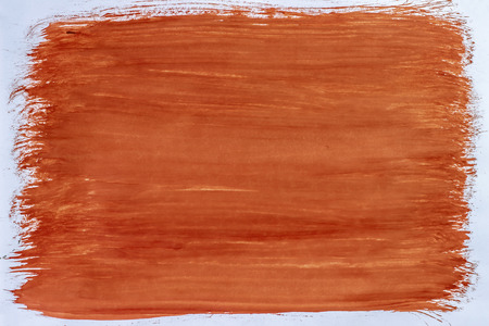 Smeared leaf brush orange gouacheの写真素材