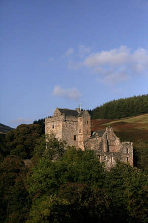 SCOTTISH CASTLE IN MOUNTAINSの写真素材