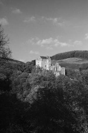 SCOTTISH CASTLE IN MOUNTAINSの写真素材