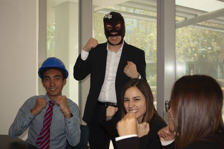 Boss in the office wearing a wrestler mask moves to the team enthusiasm the architect and his...