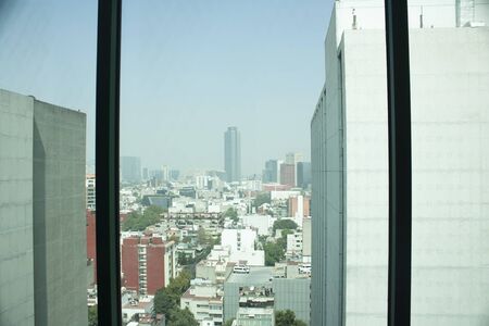 Daytime city landscape of Mexico City showing the great city