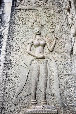 Only one apsara statue at  angkor wat Cambodia that can see teethの写真素材