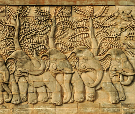 stucco carved wall depicting group of elephants  (all over oneの写真素材