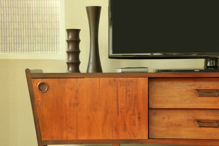 retro decoration on television cabinet in roomの写真素材