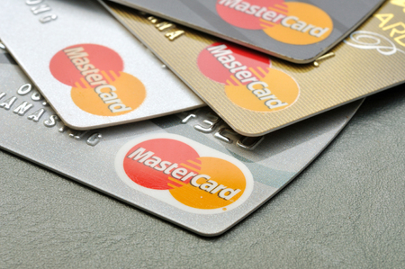 BANGKOK,THAILAND - January 28,2015:  Mastercard credit cards on leather board.のeditorial素材