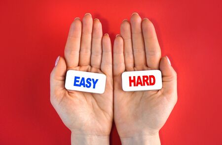 Easy way or hard way. Concept with blocks and text in a hands.の写真素材
